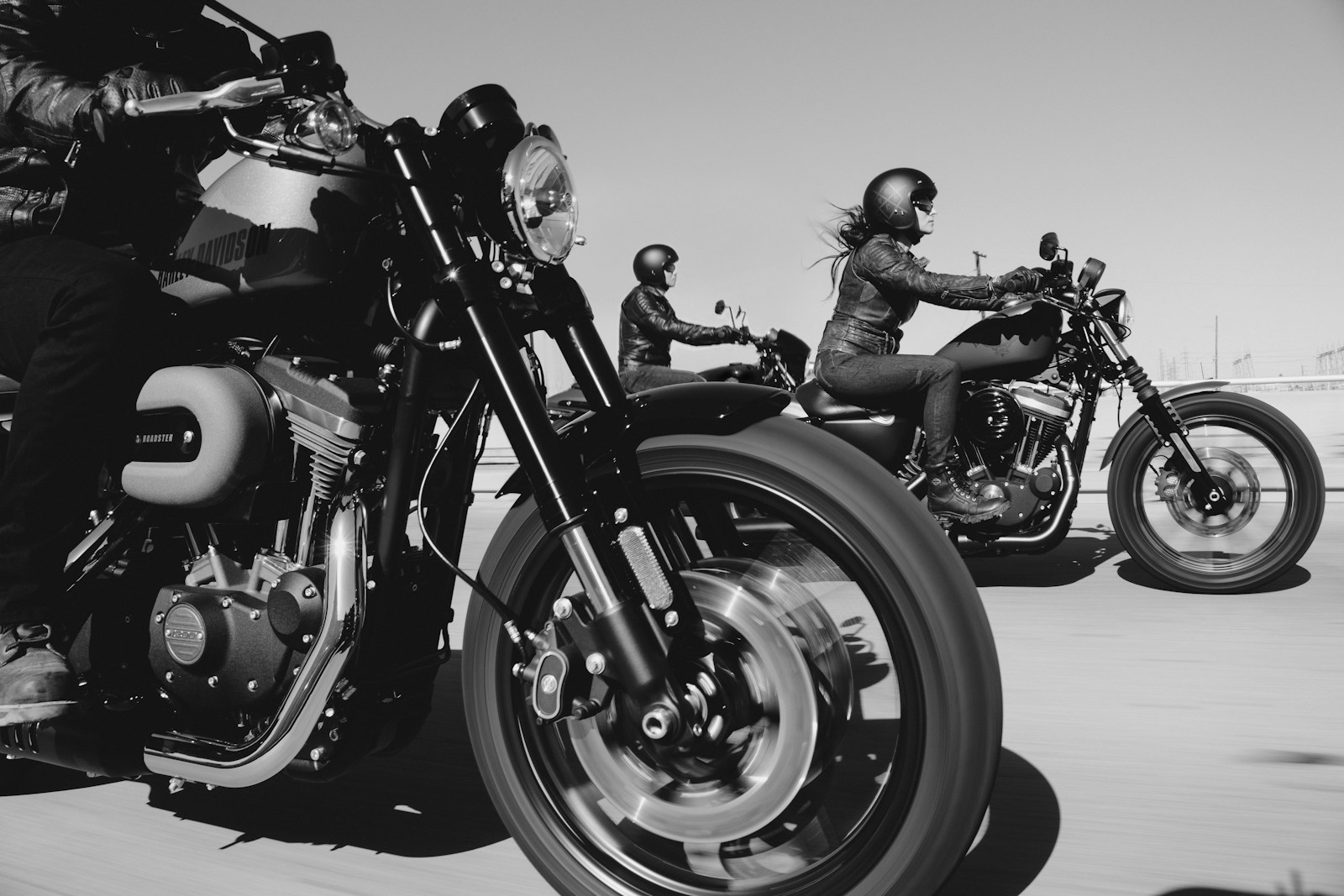 black and white photo of people riding motorcycle, motorcycle